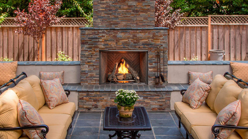 Outdoor Lifestyles Courtyard fireplace patio setting