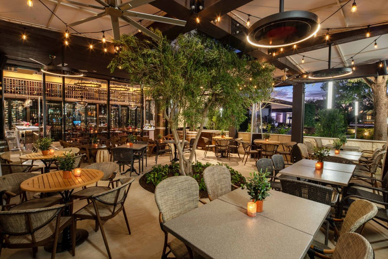Eclipse pendant heaters installed over a bar terrace