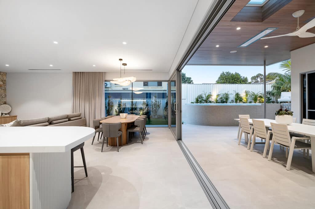 Bromic Platinum Smart-Heat Electric heater installed on a covered patio ceiling, black finish